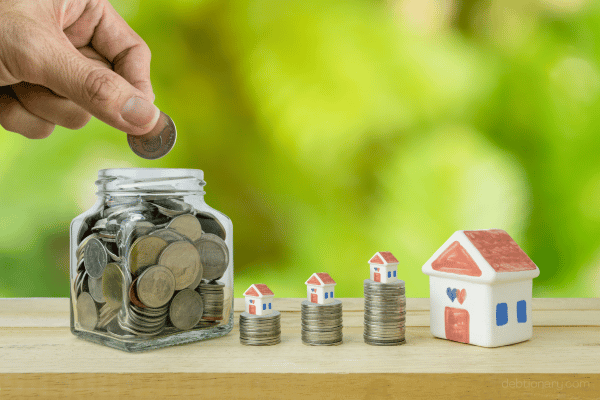 How to Save for a House While Still in Debt